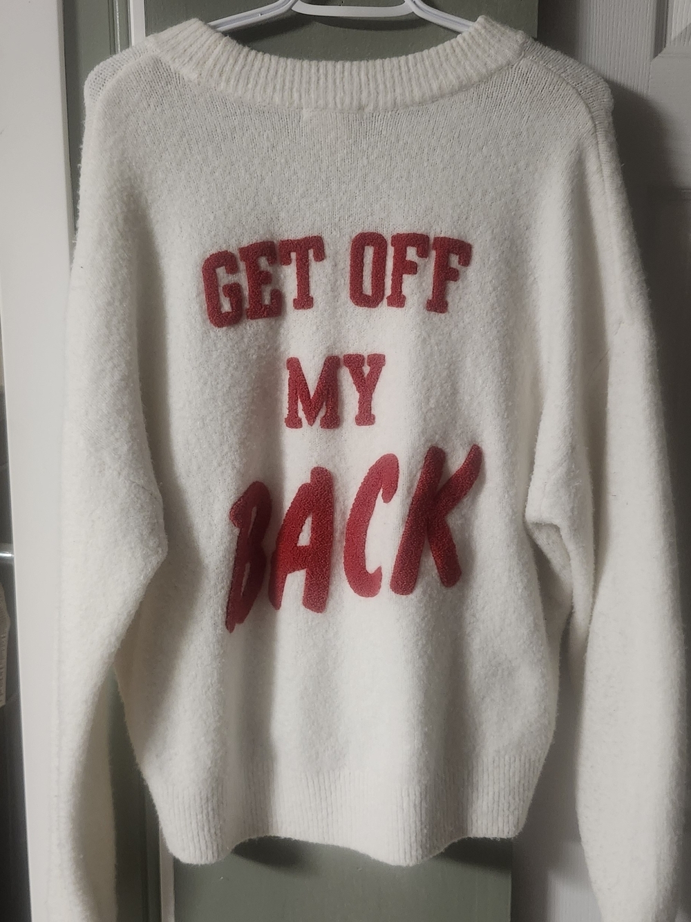 H&M White Crewneck Sweater with Red 'GET OFF MY BACK' Graphic